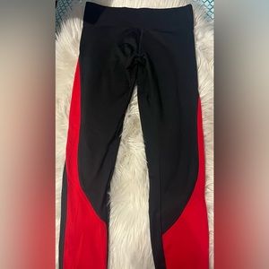 black and red “pink” yoga pants